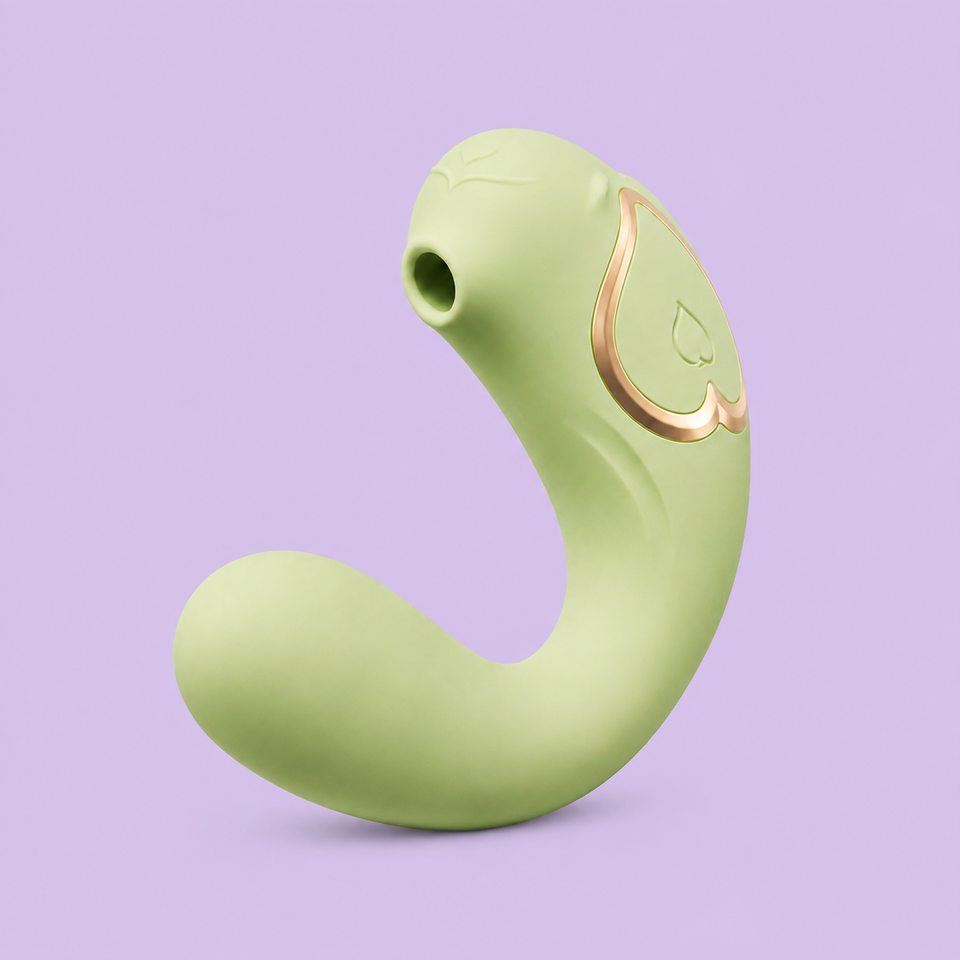 Heated wearable suction vibrator